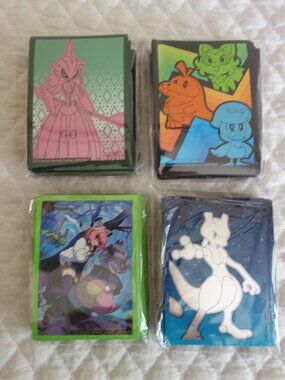 (i)	Lot of 4 NIP 65 count ea POKEMAN Trading Card Sleeves